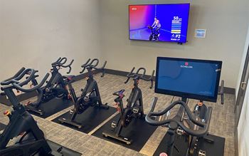Cycle studio featuring fitness on-demand